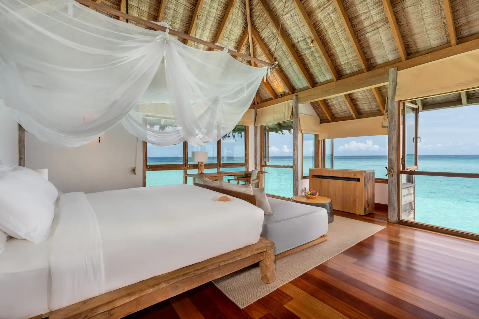 a serene gili lagoon residence bedroom view at gili lankanfushi maldives overlooking the calm turquoise lagoon
