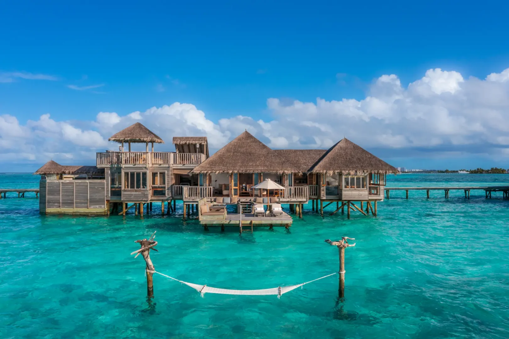 an inviting gili lagoon residence exterior at gili lankanfushi maldives set above calm turquoise lagoon waters