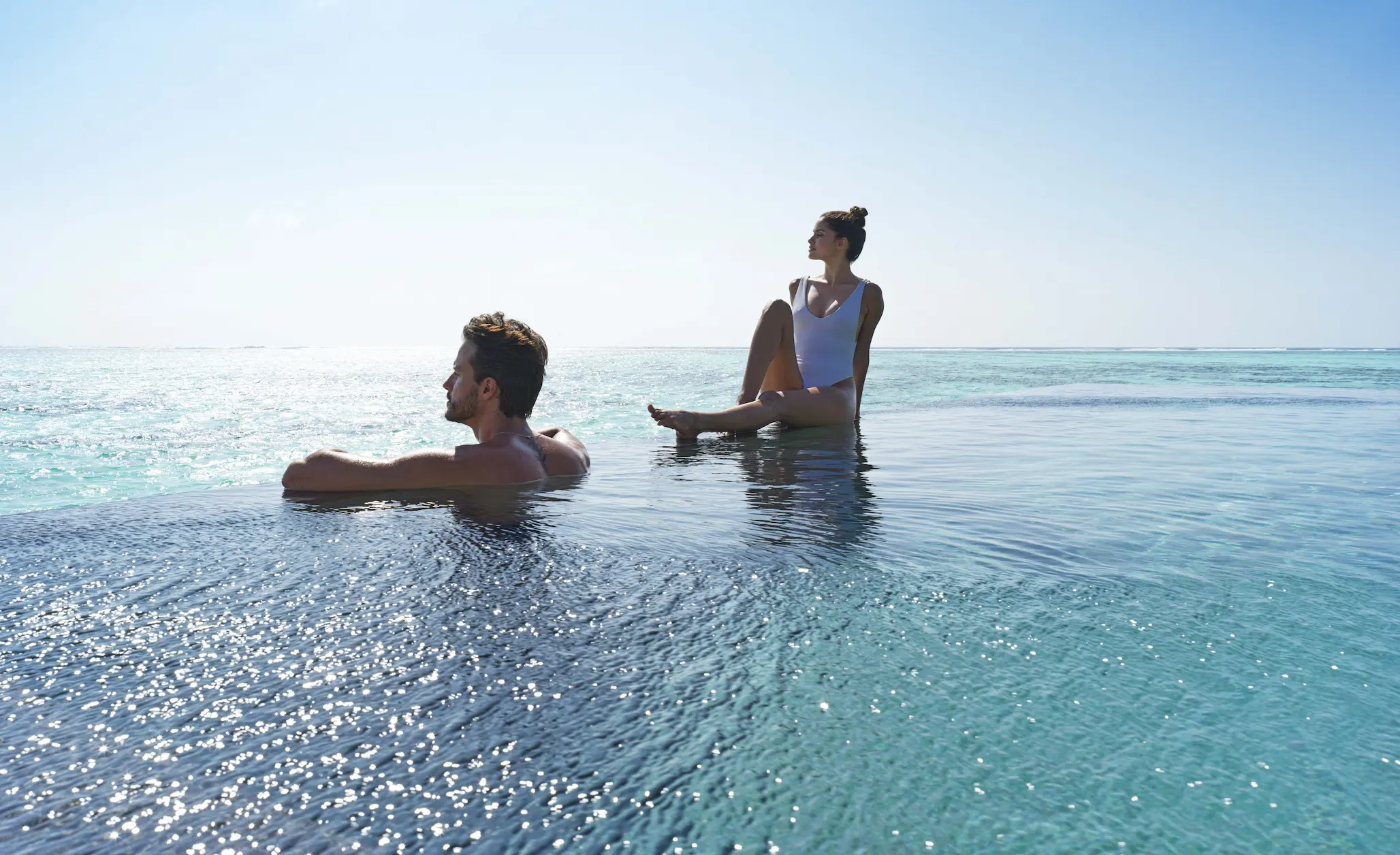 a tranquil infinity pool view photo moments scene at gili lankanfushi maldives capturing soft lagoon light