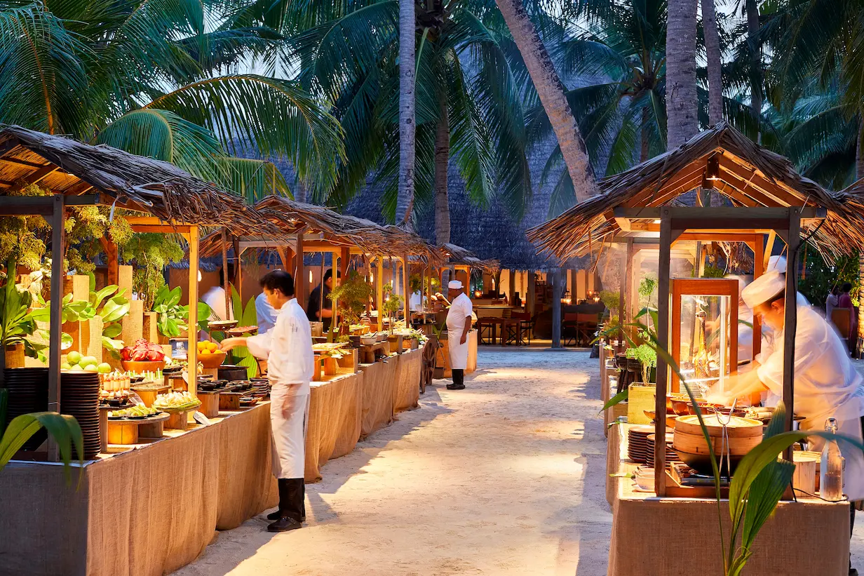 a vibrant kashiveli asian street market scene at gili lankanfushi maldives showcasing colourful flavours and open island ambience