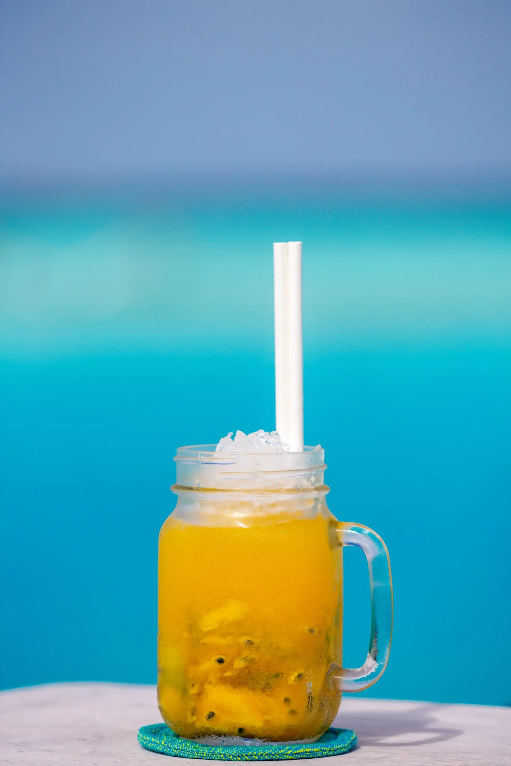 a crafted signature cocktail dhoni at gili lankanfushi maldives showcasing tropical flavours and relaxed island ambience
