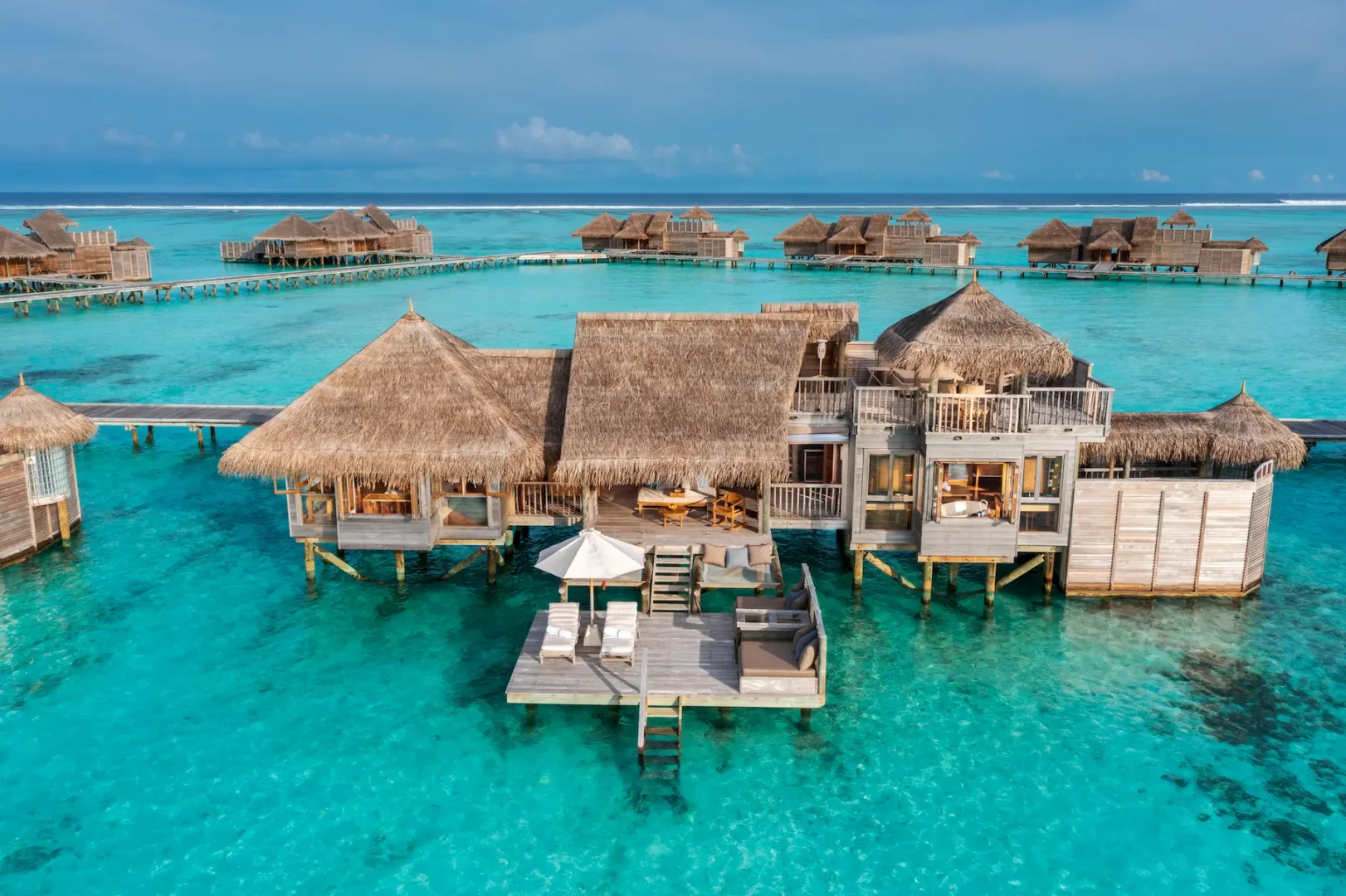 a peaceful terrace perspective of the villa suite overlooking the ocean at gili lankanfushi maldives