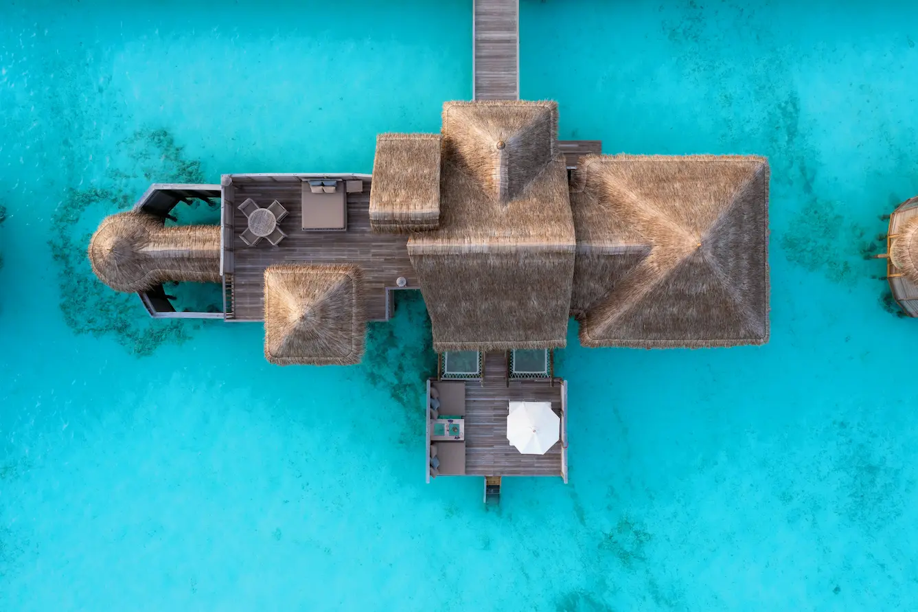 a serene aerial view of the villa suite at gili lankanfushi maldives