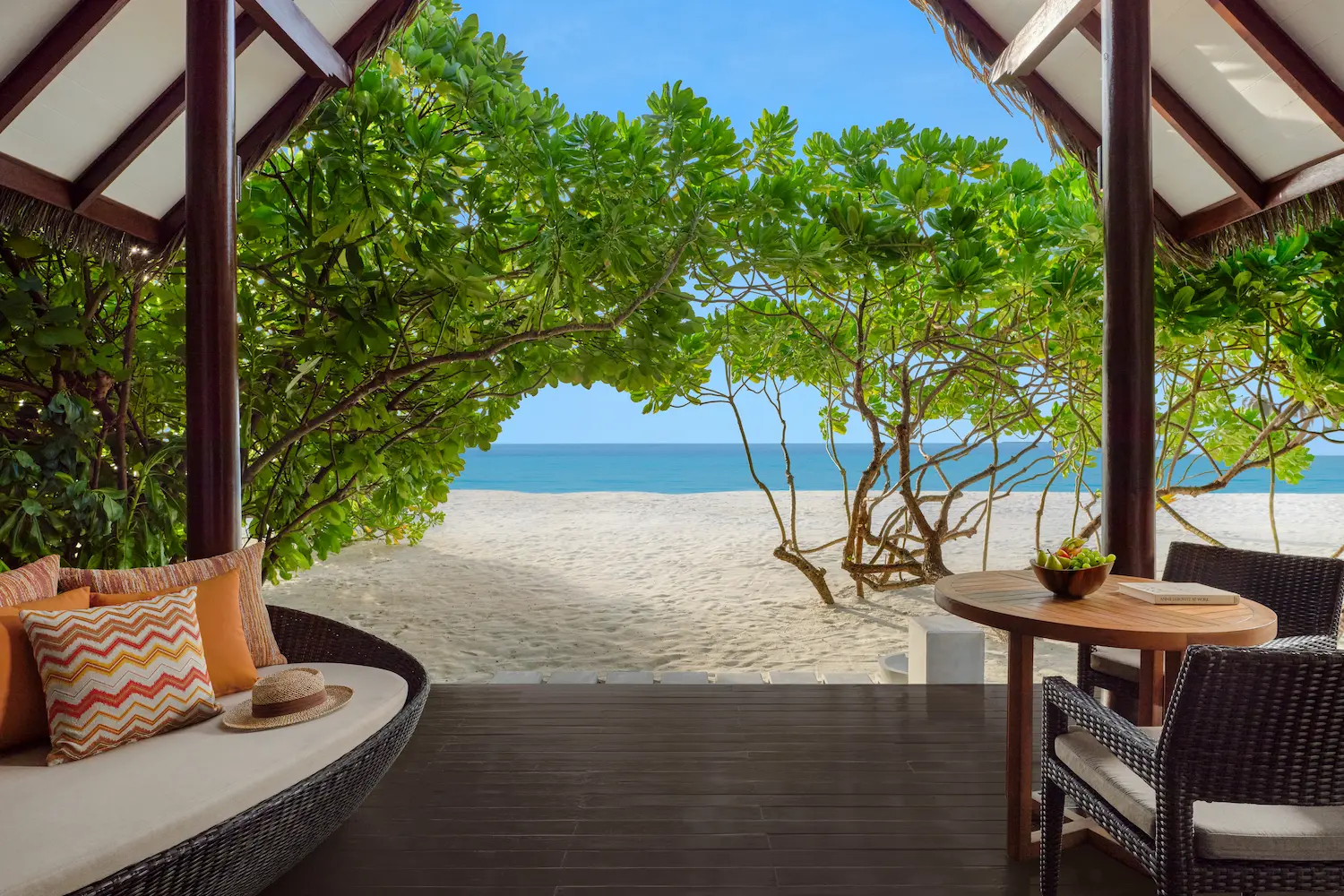 heritance aarah maldives beach villa terrace overlooking a tranquil oceanfront scene