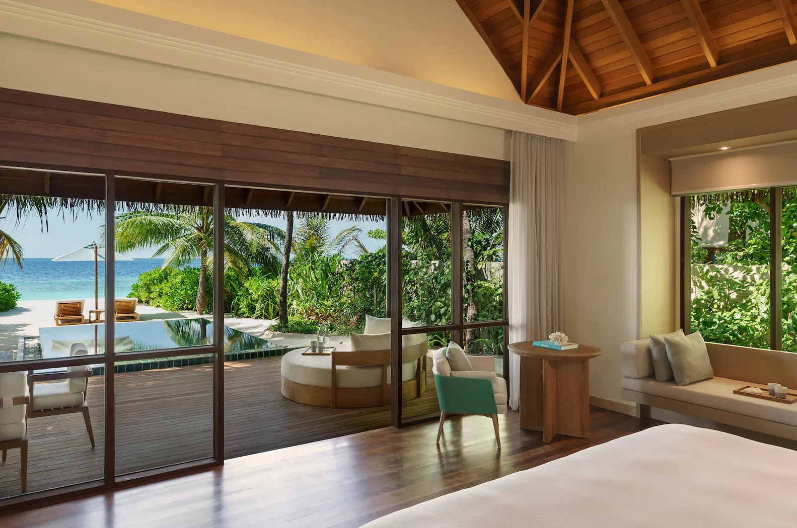 heritance aarah maldives deluxe beach bungalow view highlighting serene beachfront scenery with soft tropical light and turquoise ocean horizons