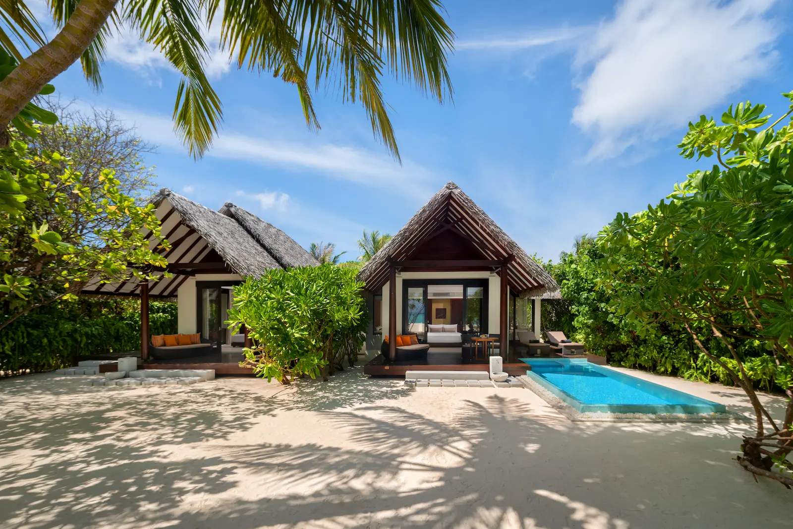 heritance aarah maldives family beach pool villa facade showcasing an elegant beachfront exterior with serene tropical surroundings