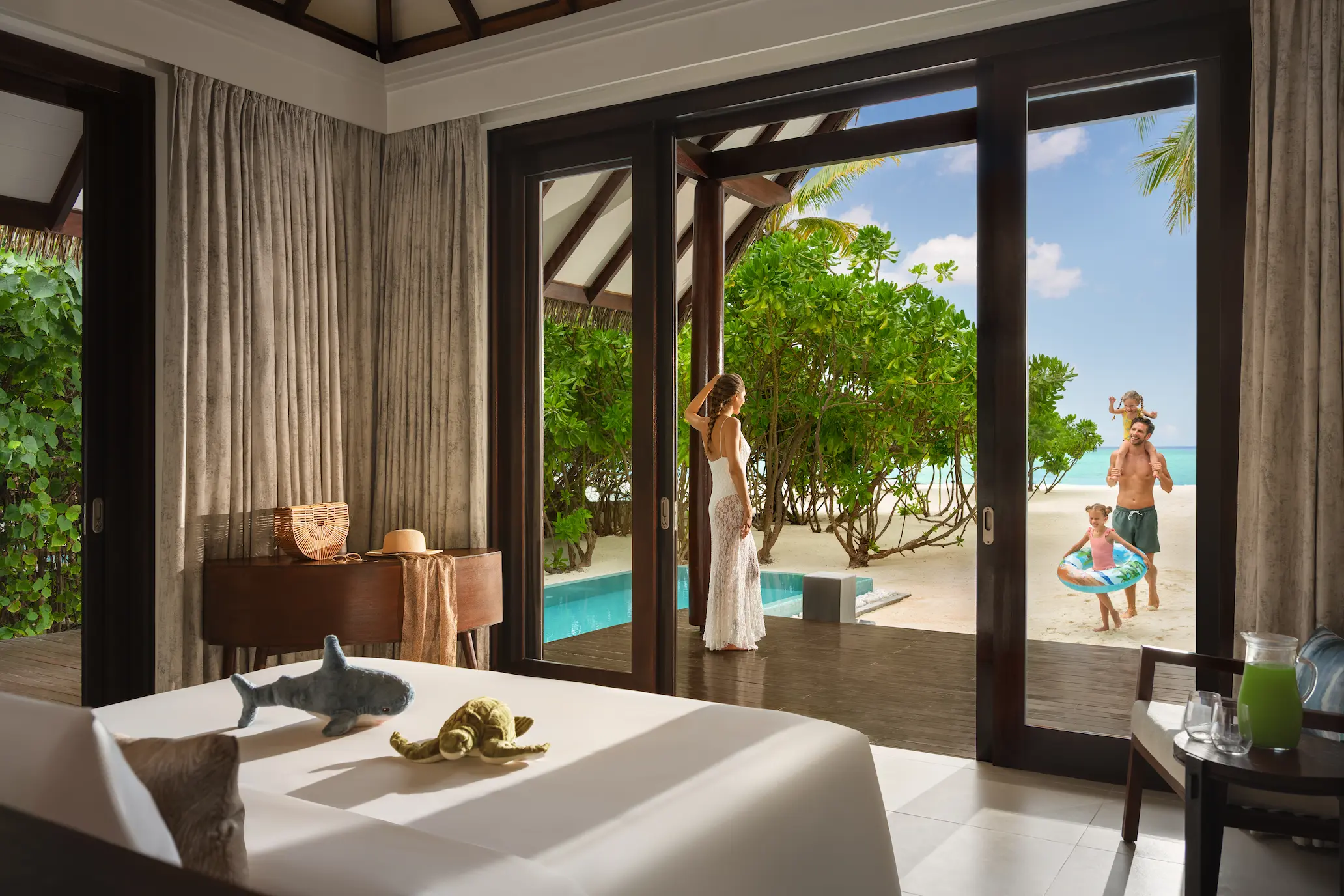 heritance aarah maldives family beach pool villa lifestyle capturing a refined beachfront atmosphere with elegant tropical living