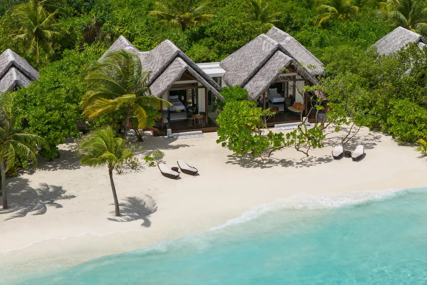 heritance aarah maldives family beach villa aerial facade showcasing a spacious beachfront exterior and serene island surroundings