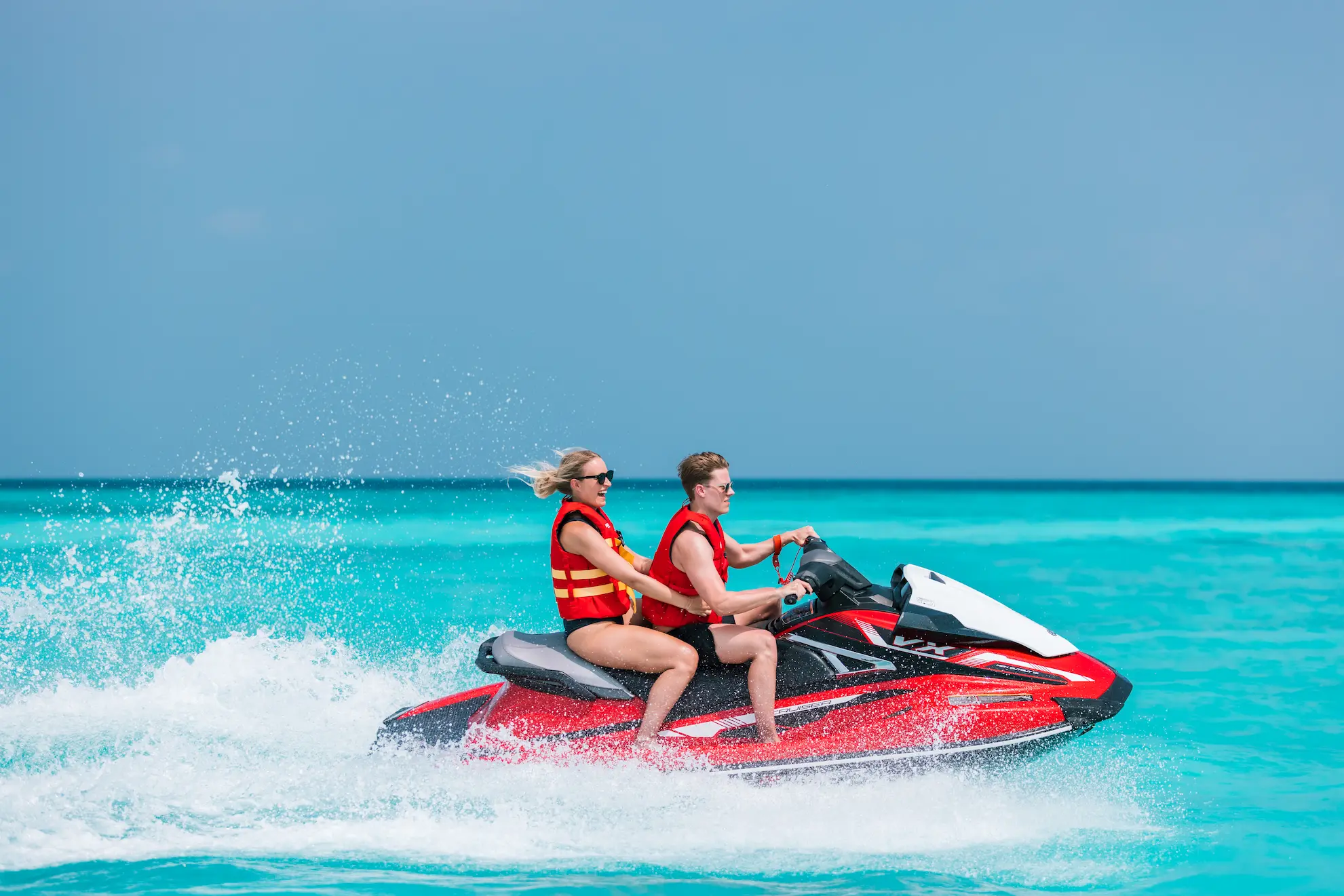 heritance aarah maldives jet ski adventure across clear turquoise waters with dynamic tropical energy