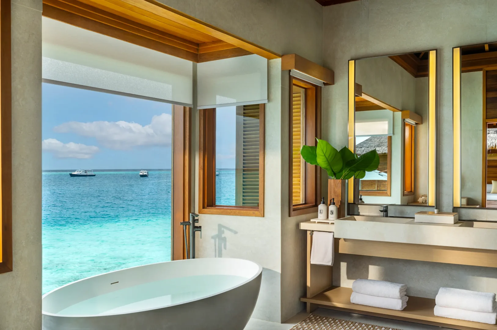 heritance aarah maldives lagoon bungalow with pool bathroom featuring a refined overwater ensuite with elegant finishes and tranquil lagoon views