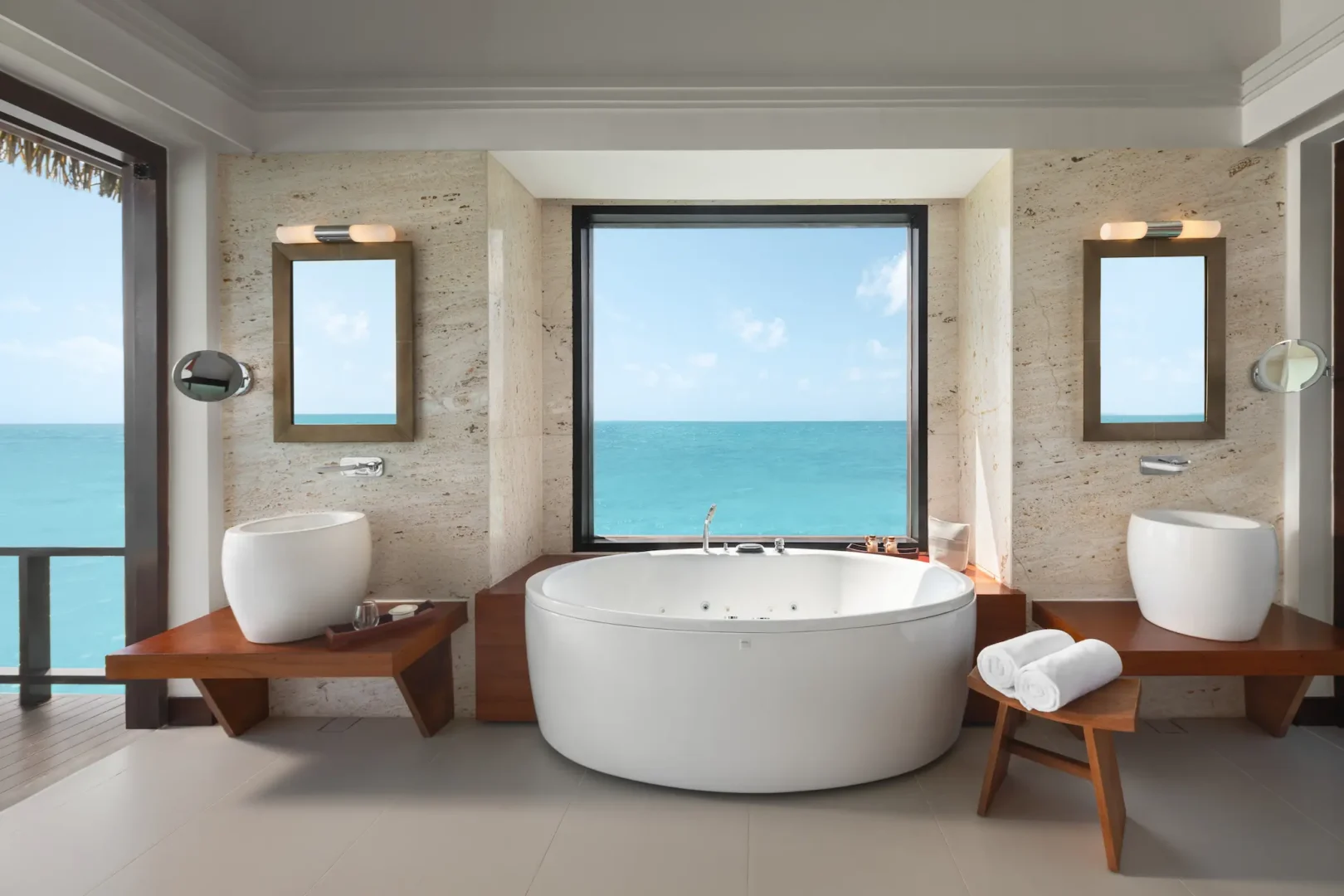 heritance aarah maldives ocean residence bathroom featuring an elegant overwater design with refined natural textures and a serene spa inspired ambiance