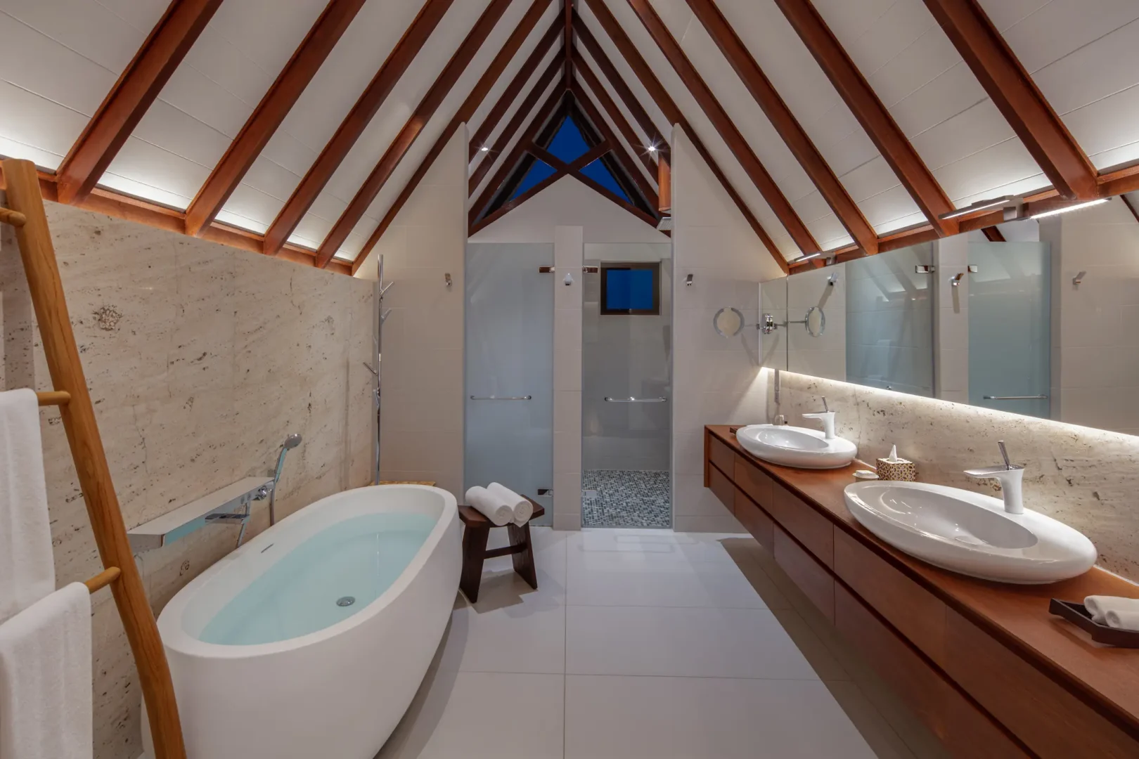 heritance aarah maldives ocean residence upstairs bathroom featuring an elegant overwater design with refined natural textures and a serene spa inspired ambiance