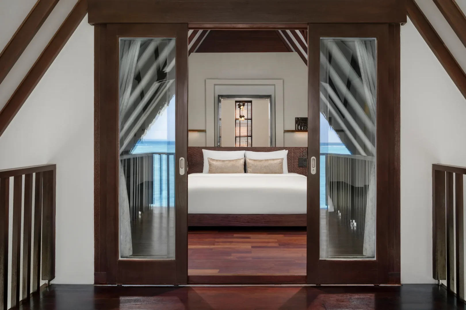 heritance aarah maldives ocean residence upstairs room featuring an elegant overwater interior with refined natural textures and serene lagoon facing ambience