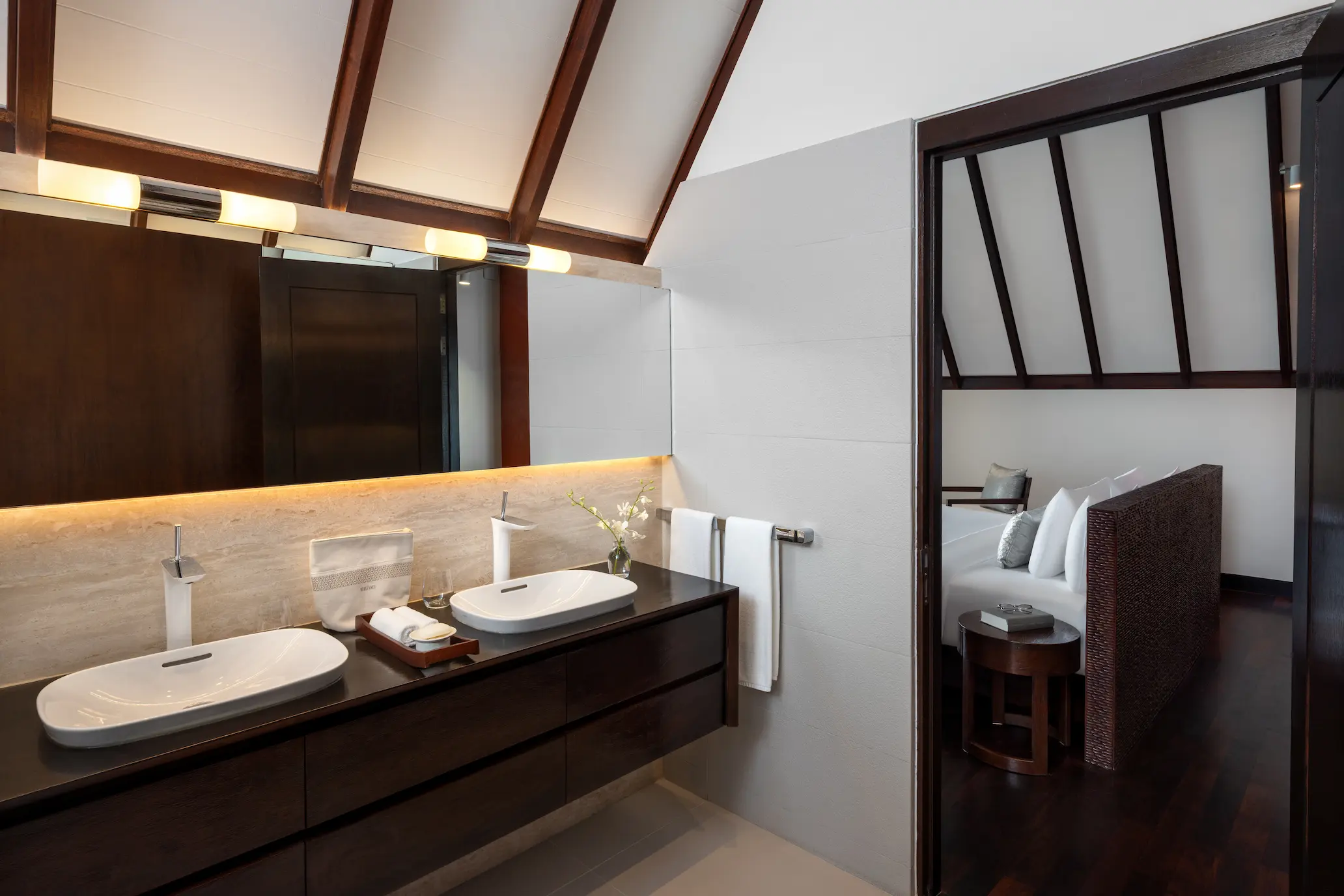 heritance aarah maldives ocean suite upstairs bathroom featuring elegant overwater design with refined natural textures and a serene spa inspired ambiance