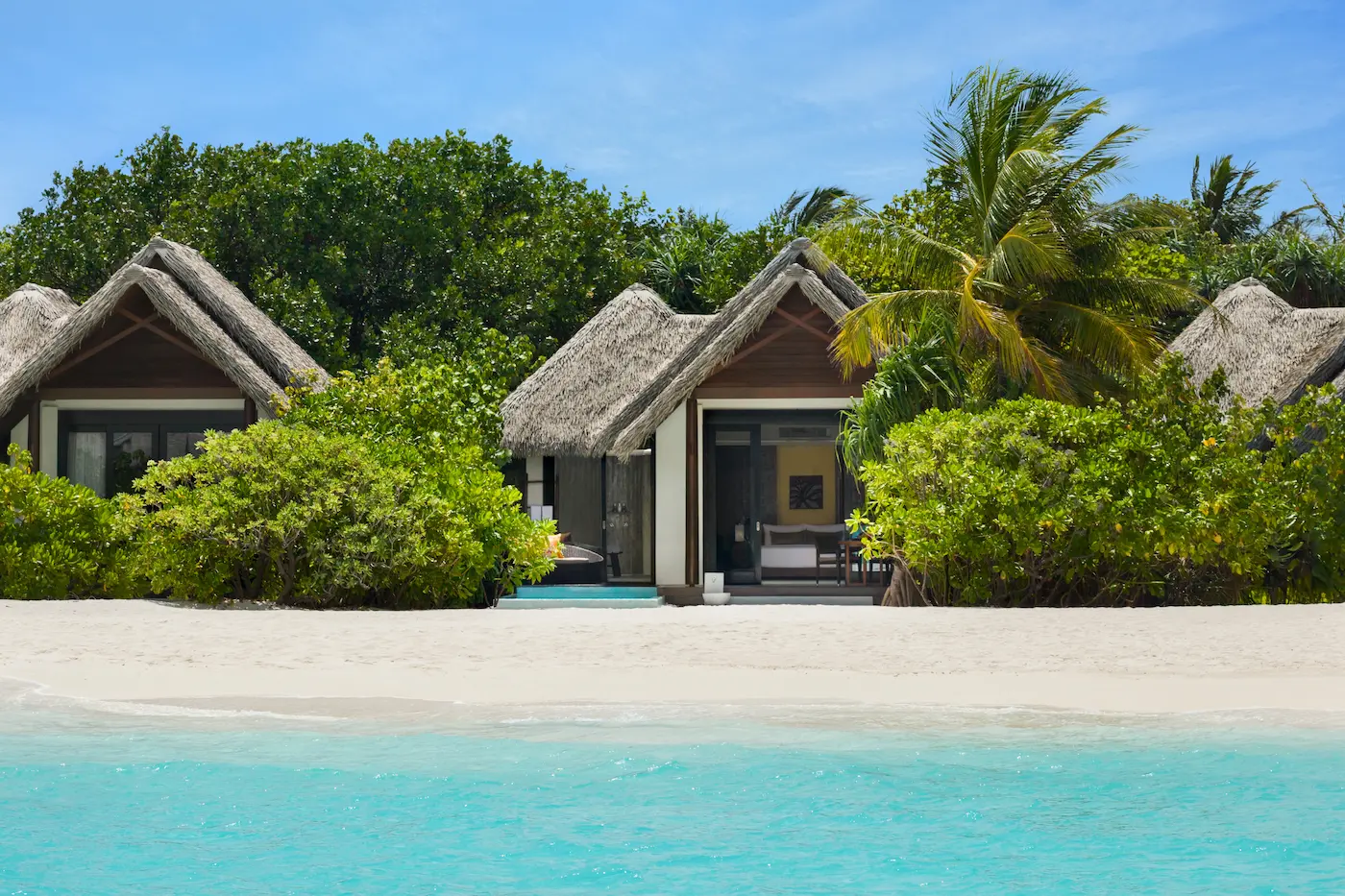 heritance aarah maldives pool beach villa beach view overlooking a serene shoreline with elegant tropical ambience