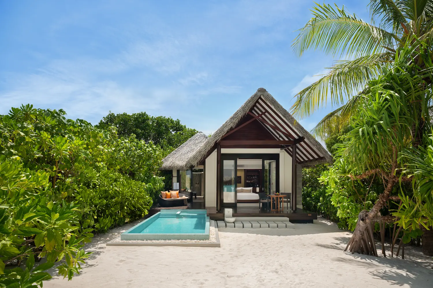heritance aarah maldives pool beach villa facade showcasing an elegant beachfront exterior with serene tropical surroundings