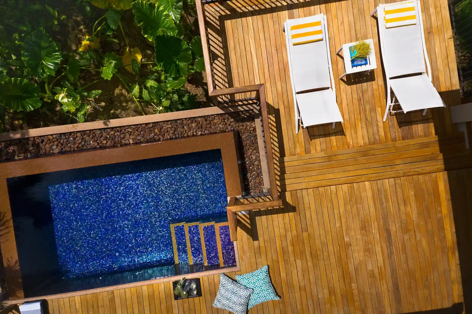 aerial view of hill side pool villa in seychelles