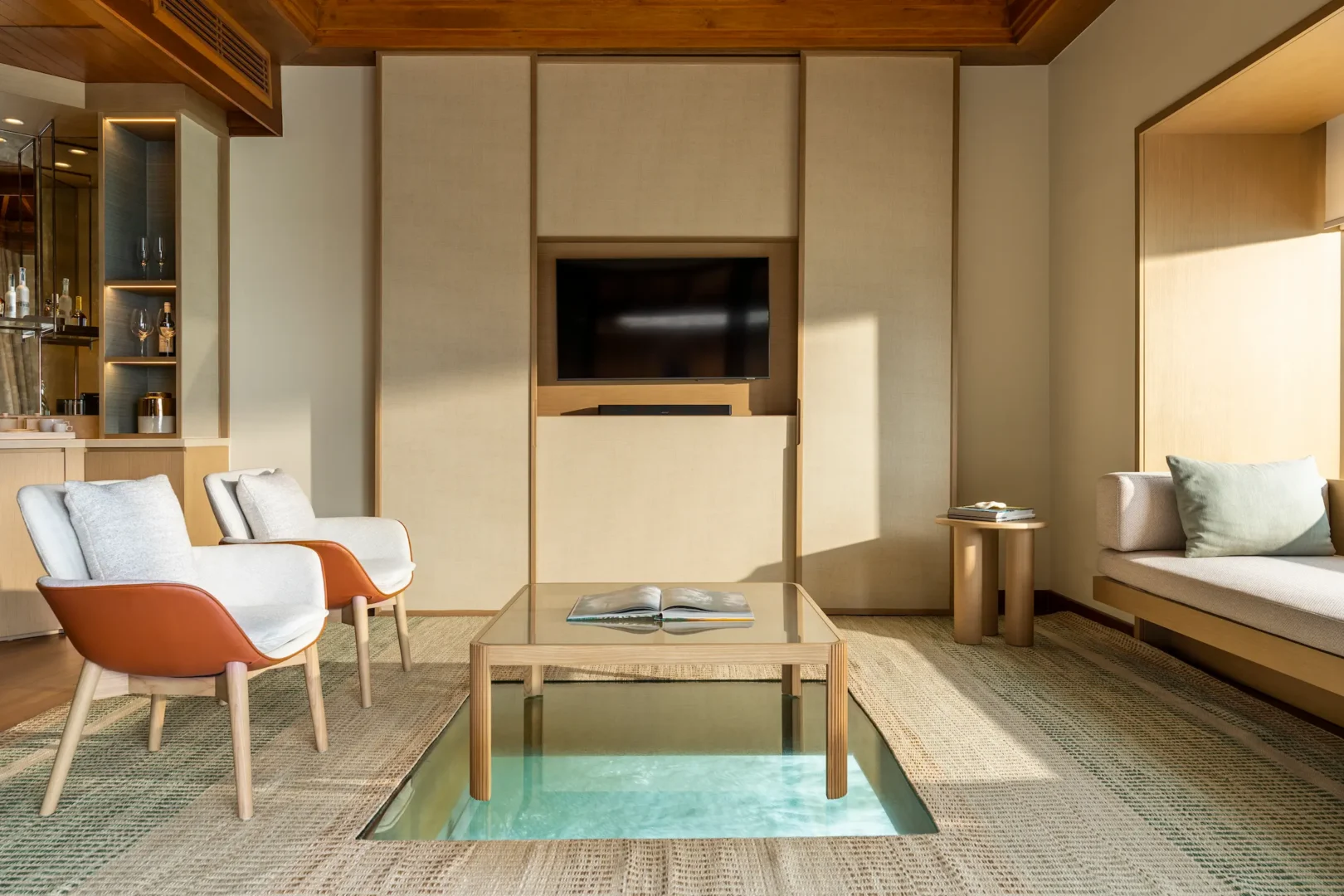huvafen fushi maldives ocean bungalow with pool glass floor showcasing an elegant overwater space with a clear lagoon view panel and serene tropical ambience