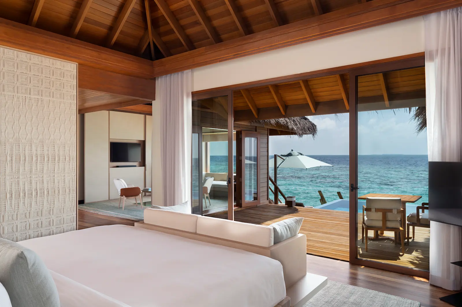 huvafen fushi maldives ocean bungalow with pool view showcasing serene overwater scenery with turquoise lagoon horizons and refined island tranquillity