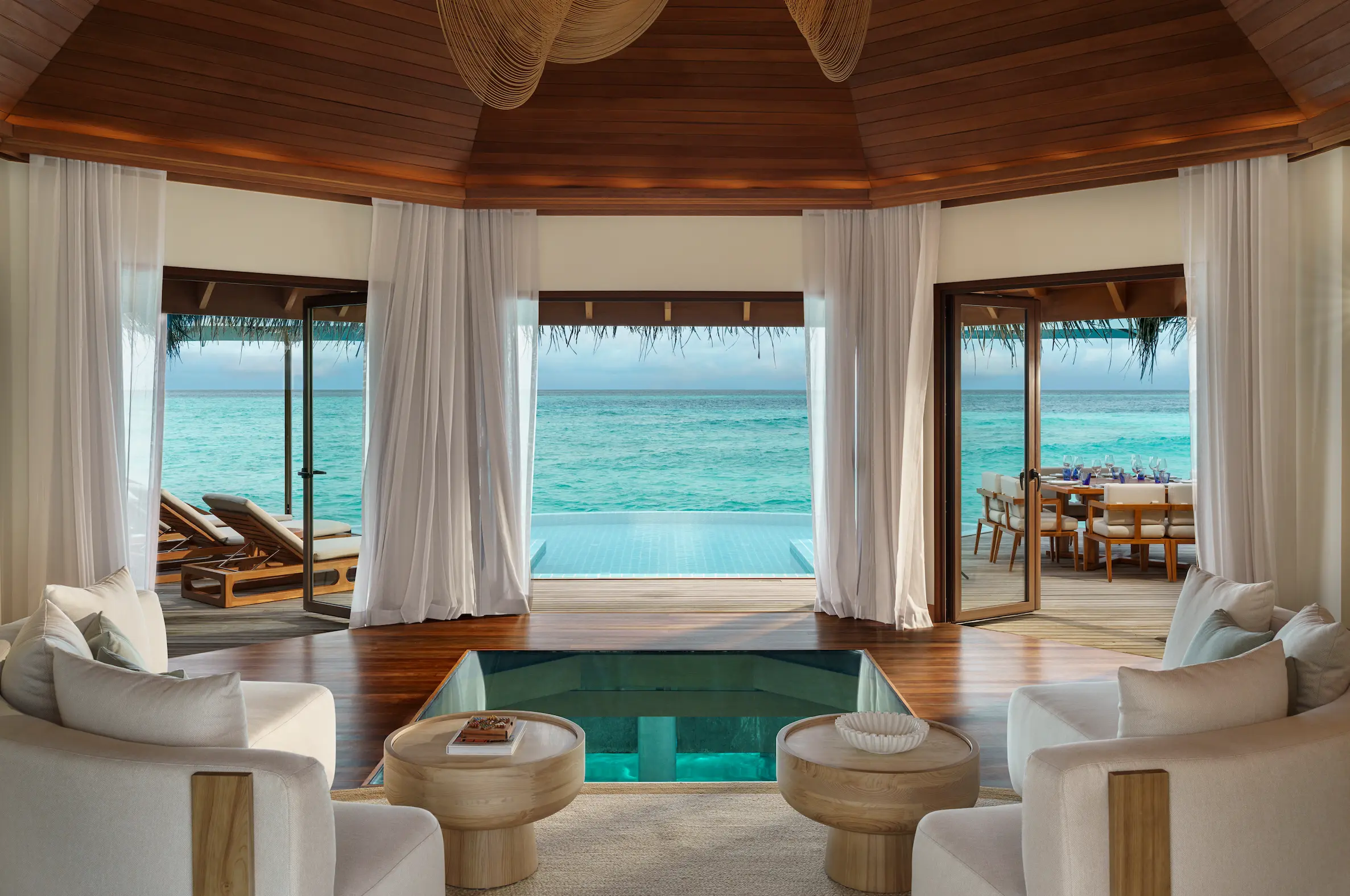 huvafen fushi maldives ocean pavilion with outdoor pool featuring an elegant beachfront residence