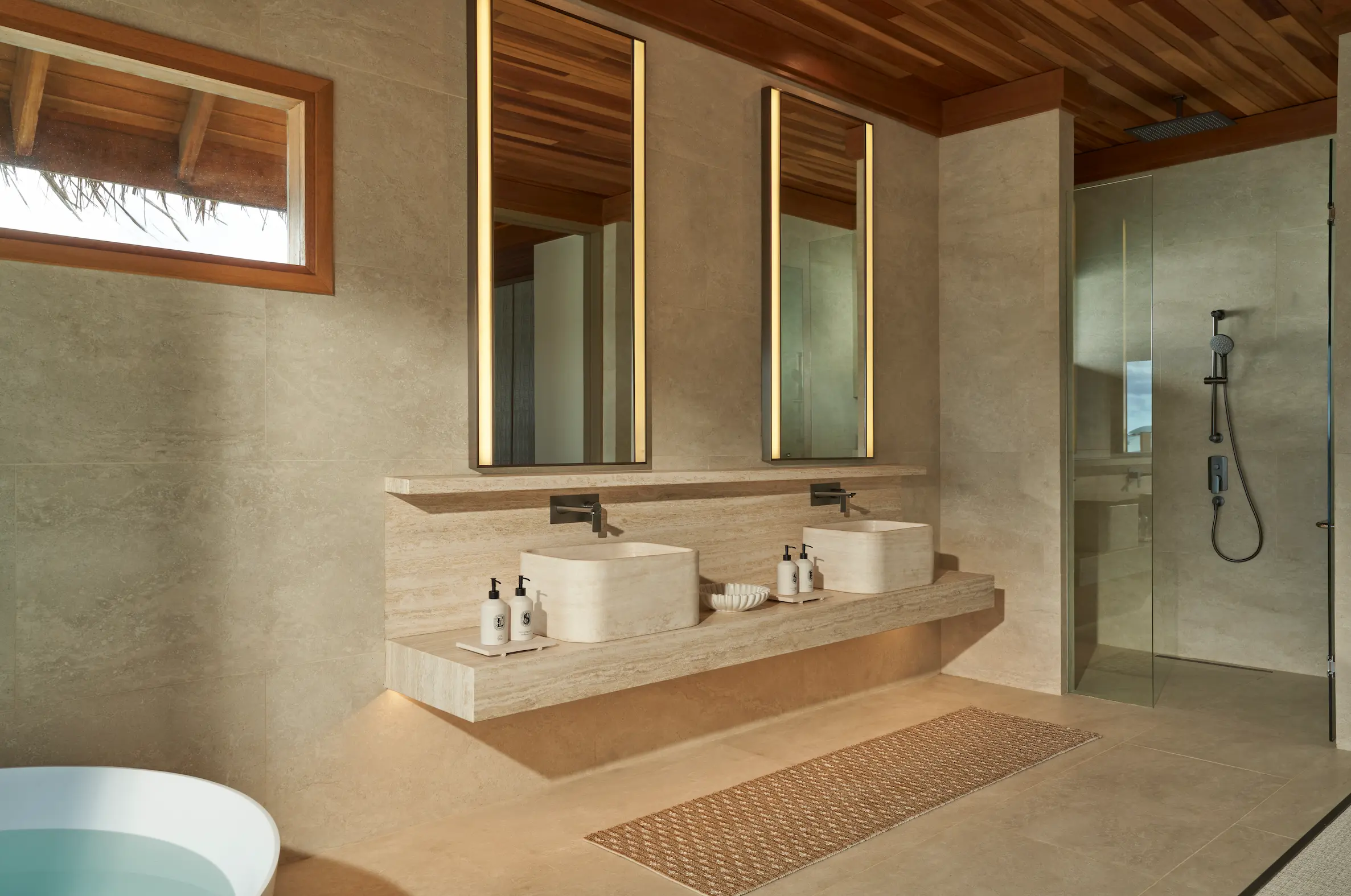 huvafen fushi maldives ocean pavilion with pool second bathroom featuring an elegant overwater ensuite