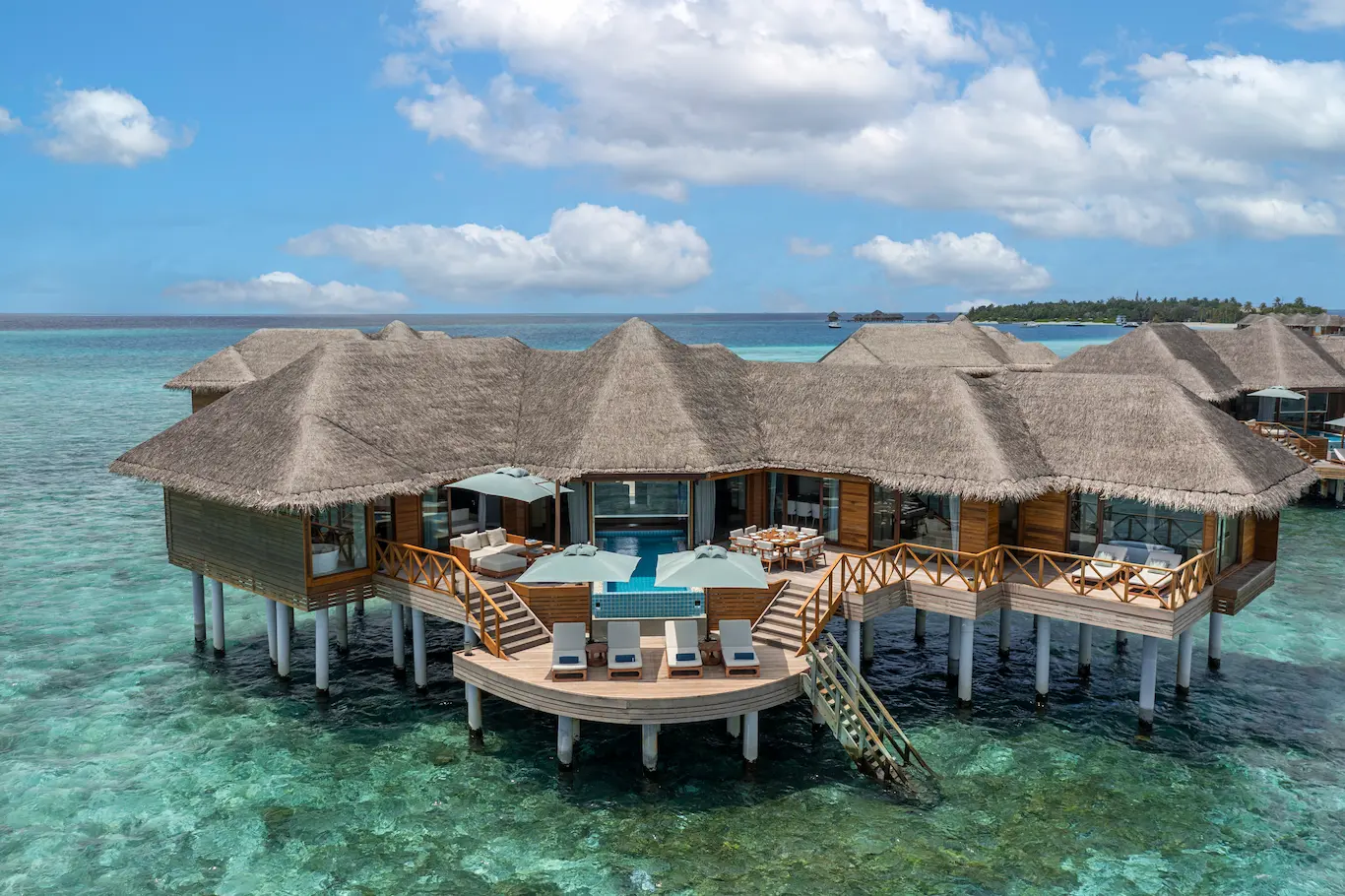 huvafen fushi maldives two bedroom ocean pavilion exterior showcasing a spacious overwater residence with serene lagoon views and refined island architecture