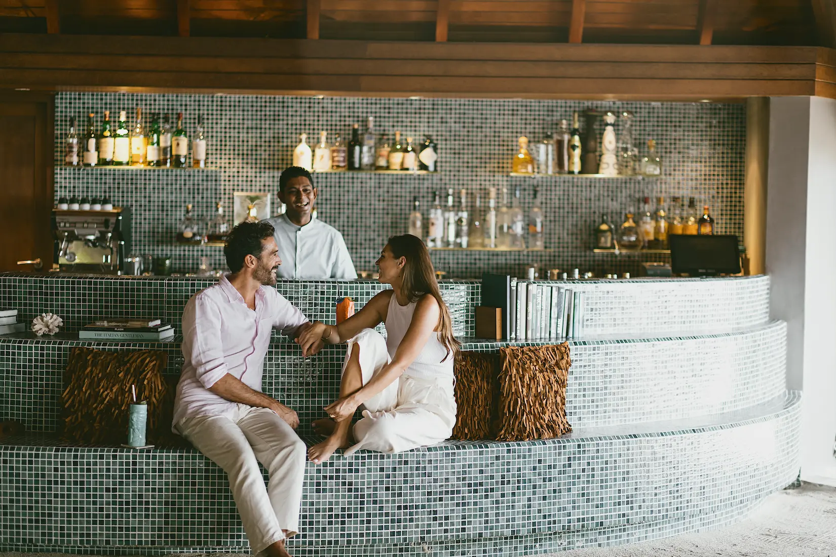 huvafen fushi maldives umbar showcasing a relaxed beachfront lounge with refined island ambience and serene ocean views
