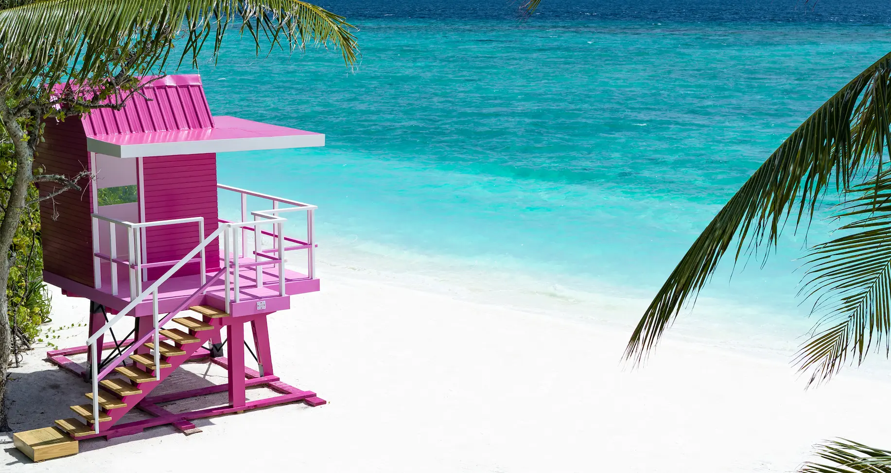 ifuru island maldives barbie tower with playful vibrant design and a fun serene island atmosphere