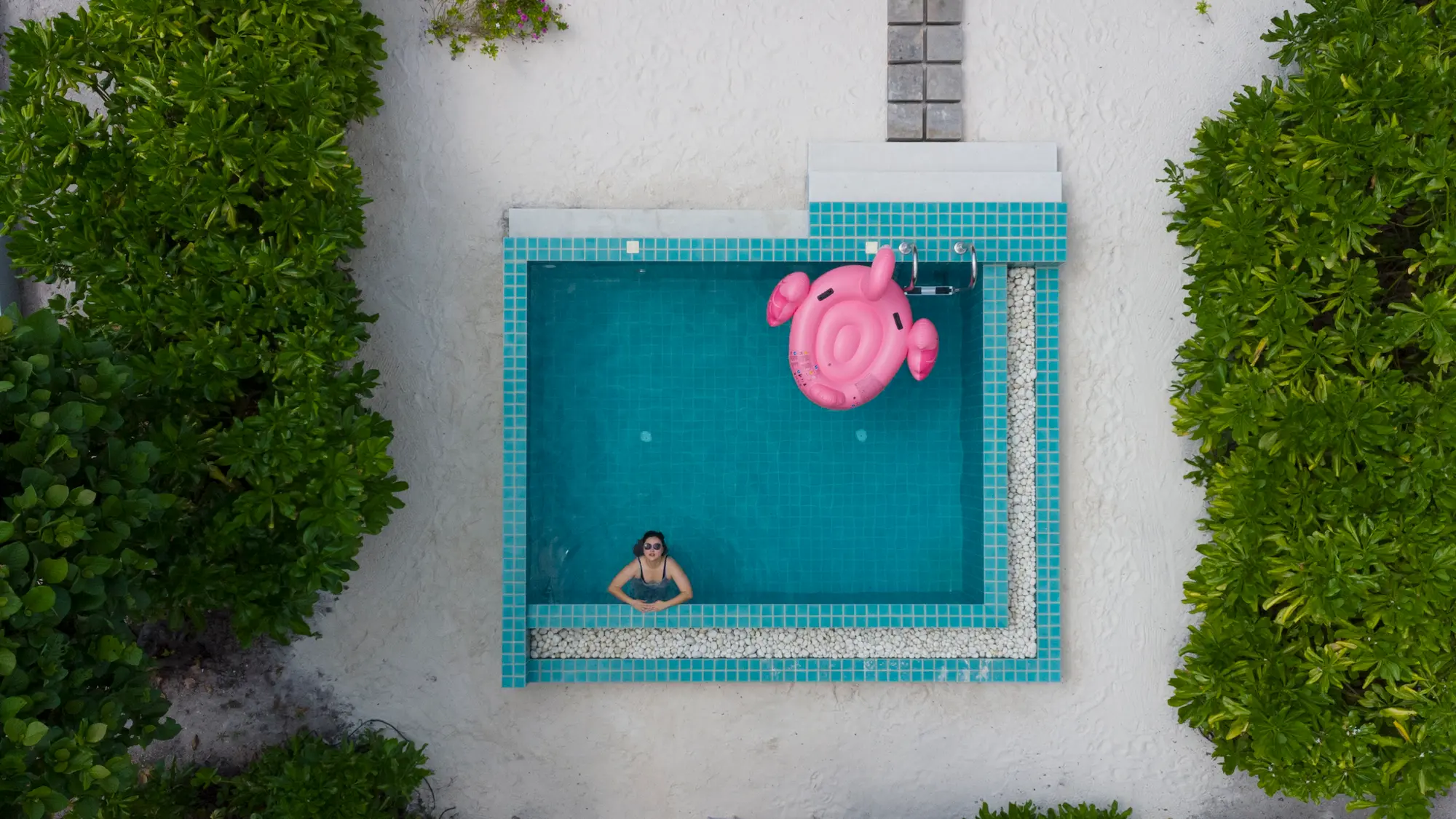ifuru island maldives sunset beach villa with pool aerial view showcasing serene island luxury and elegant contemporary beachfront design