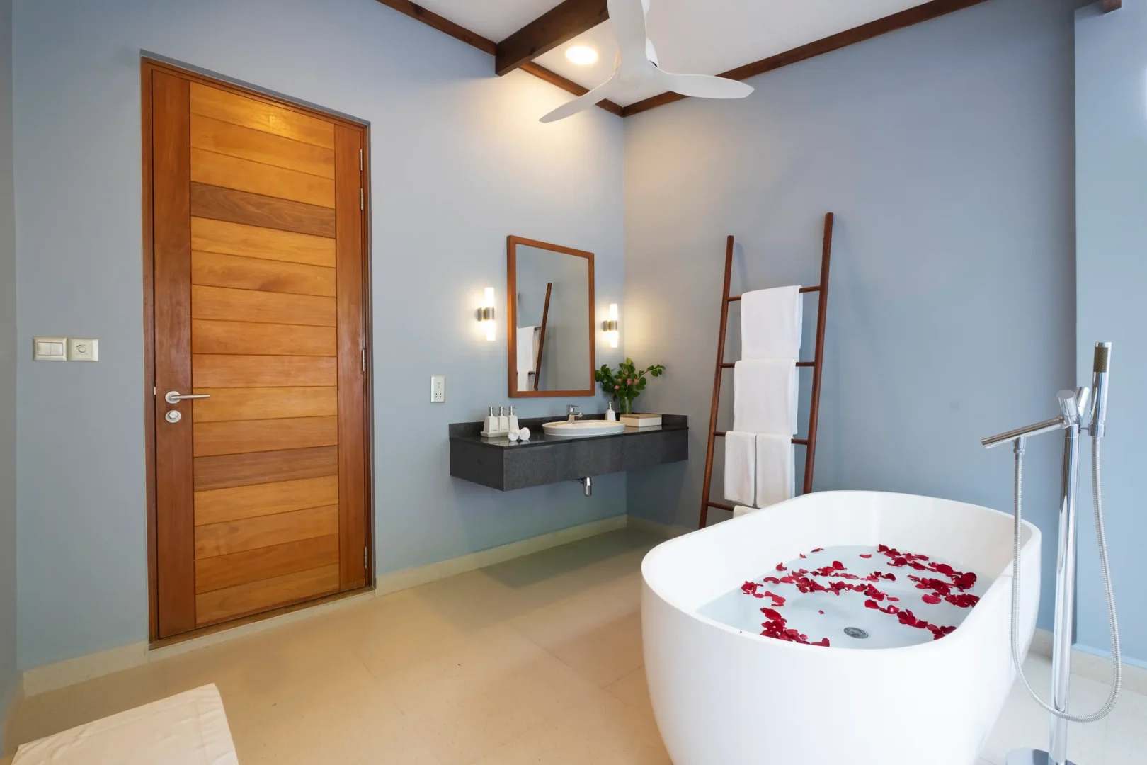 ifuru island maldives sunset beach villa with pool bathroom bathtub featuring elegant contemporary design and serene luxury island ambience