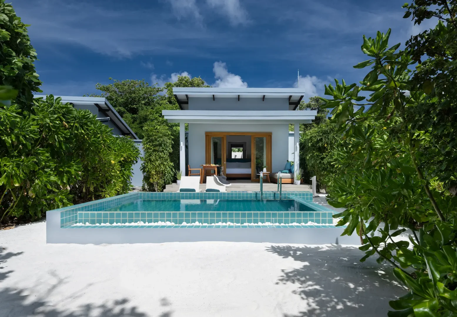 ifuru island maldives sunset beach villa with pool exterior featuring elegant contemporary beachfront design and serene island luxury ambience