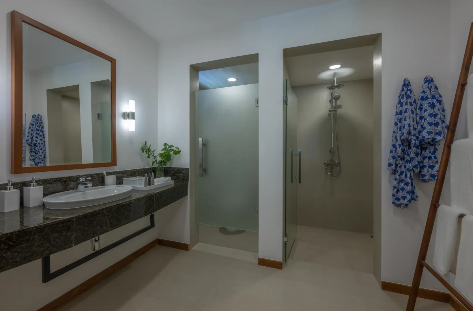 ifuru island maldives sunset sky suite bathroom with elegant contemporary finishes and a serene luxury island ambience
