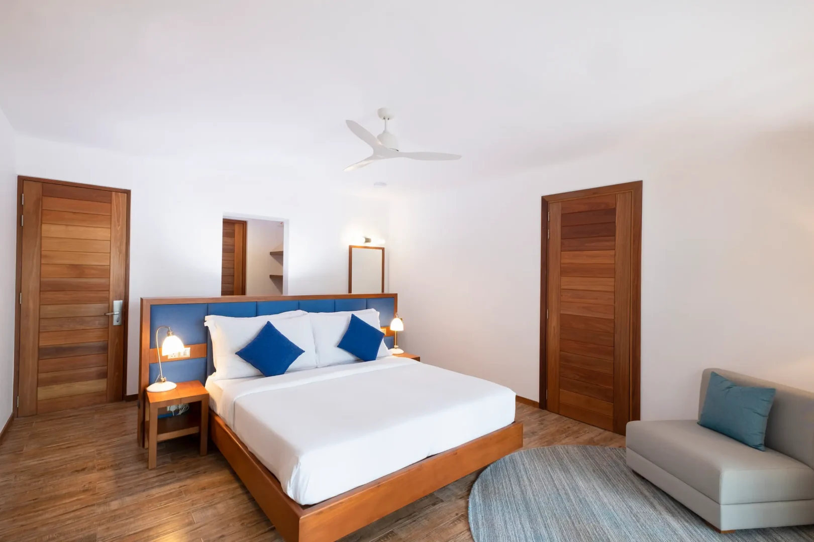 ifuru island maldives sunset sky suite bedroom with serene island luxury and refined contemporary design