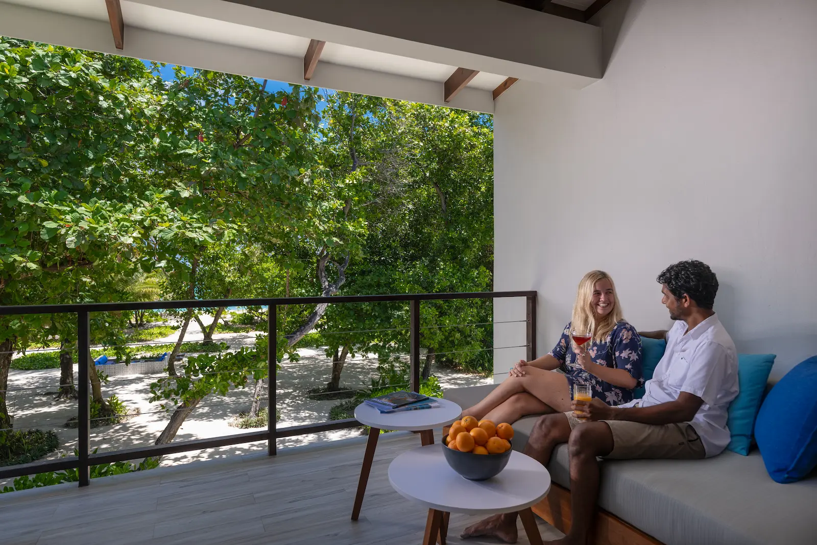 ifuru island maldives sunset sky suite lifestyle scene with serene luxury atmosphere and elegant contemporary island style