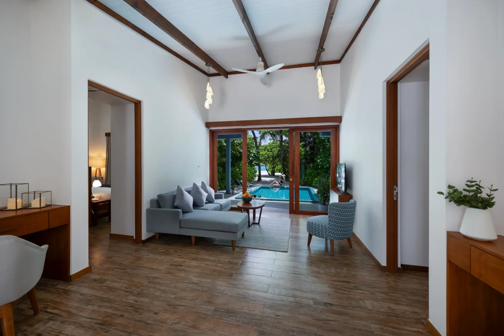 ifuru island maldives sunset two bedroom villa with pool living area featuring refined contemporary design and serene luxury island ambience