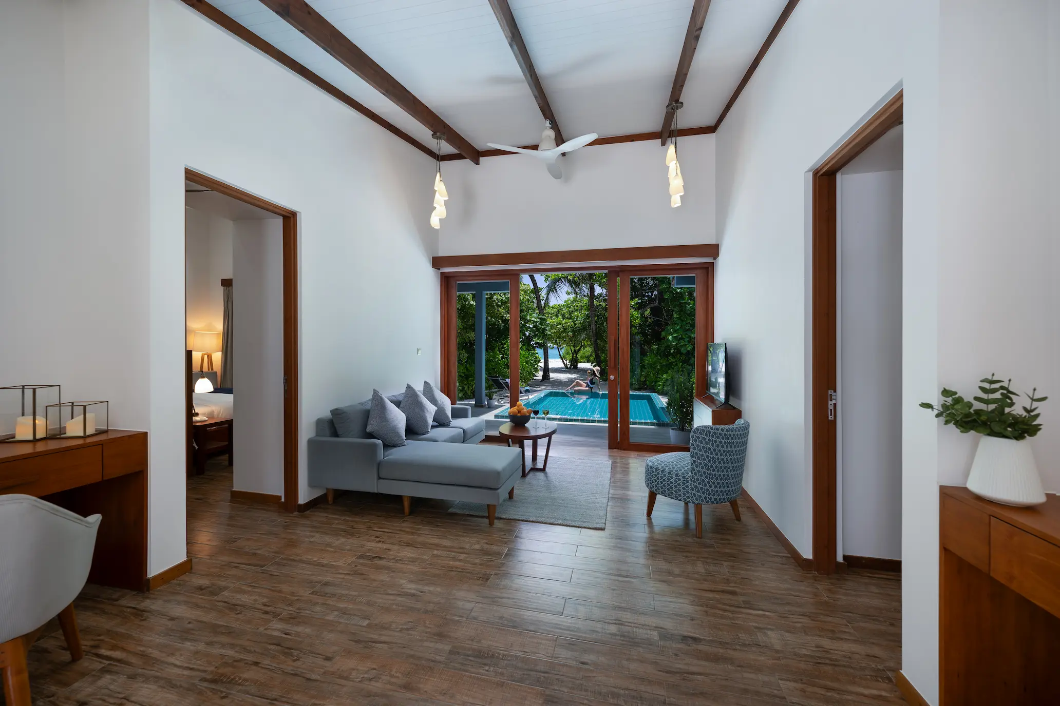 ifuru island maldives sunset two bedroom villa with pool living area featuring refined contemporary design and serene luxury island ambience
