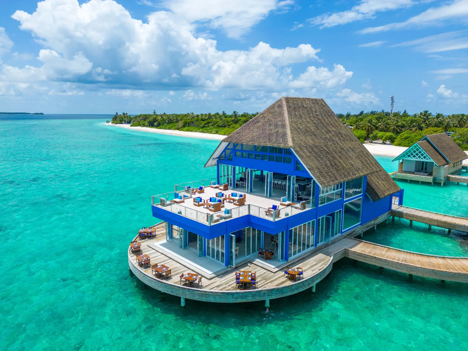 ifuru island maldives waterfront aerial view showcasing serene island luxury and elegant contemporary beachfront surroundings