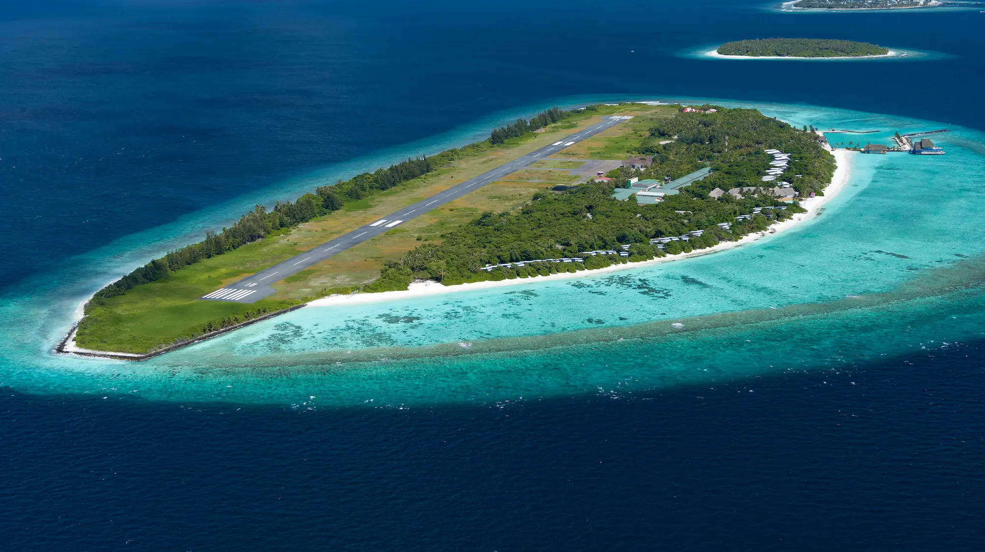 ifuru island maldives whole island aerial view showcasing expansive serene island luxury and elegant contemporary beachfront surroundings