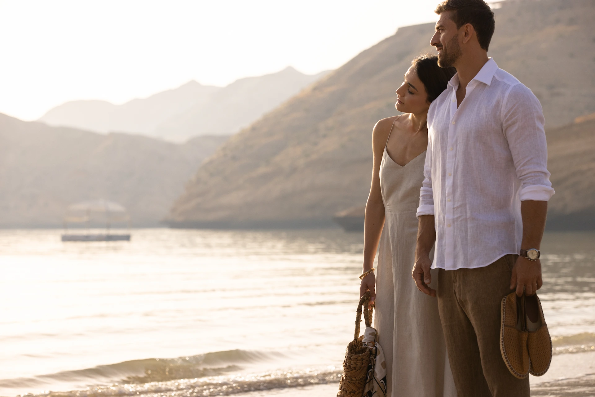 couple at jumeirah muscat bay oman enjoying a romantic coastal resort setting with sea views and tranquil luxury surroundings
