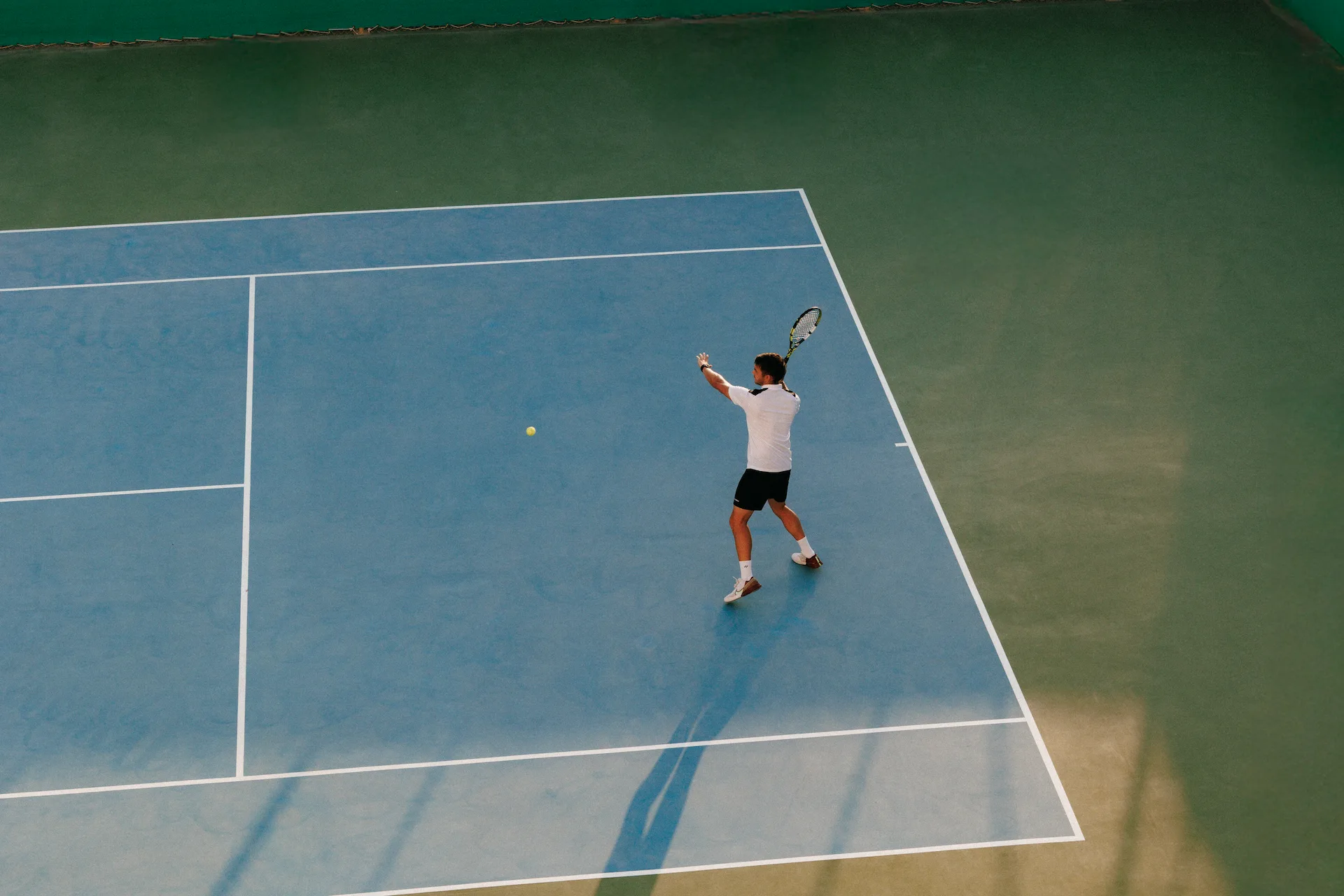 tennis court at jumeirah muscat bay oman resort with modern facilities and coastal backdrop