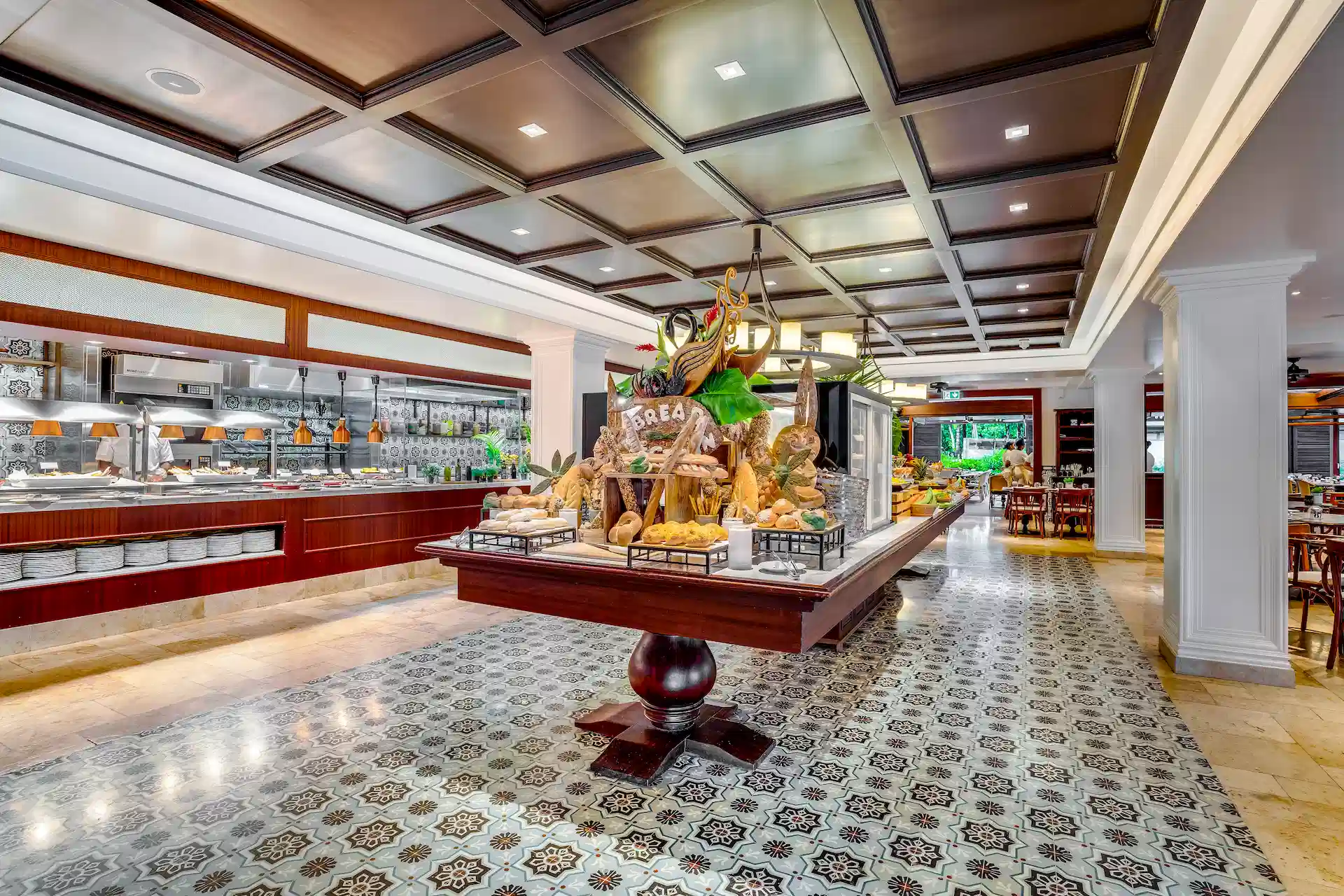 kempinski seychelles resort café lazare with outdoor seating and ocean view