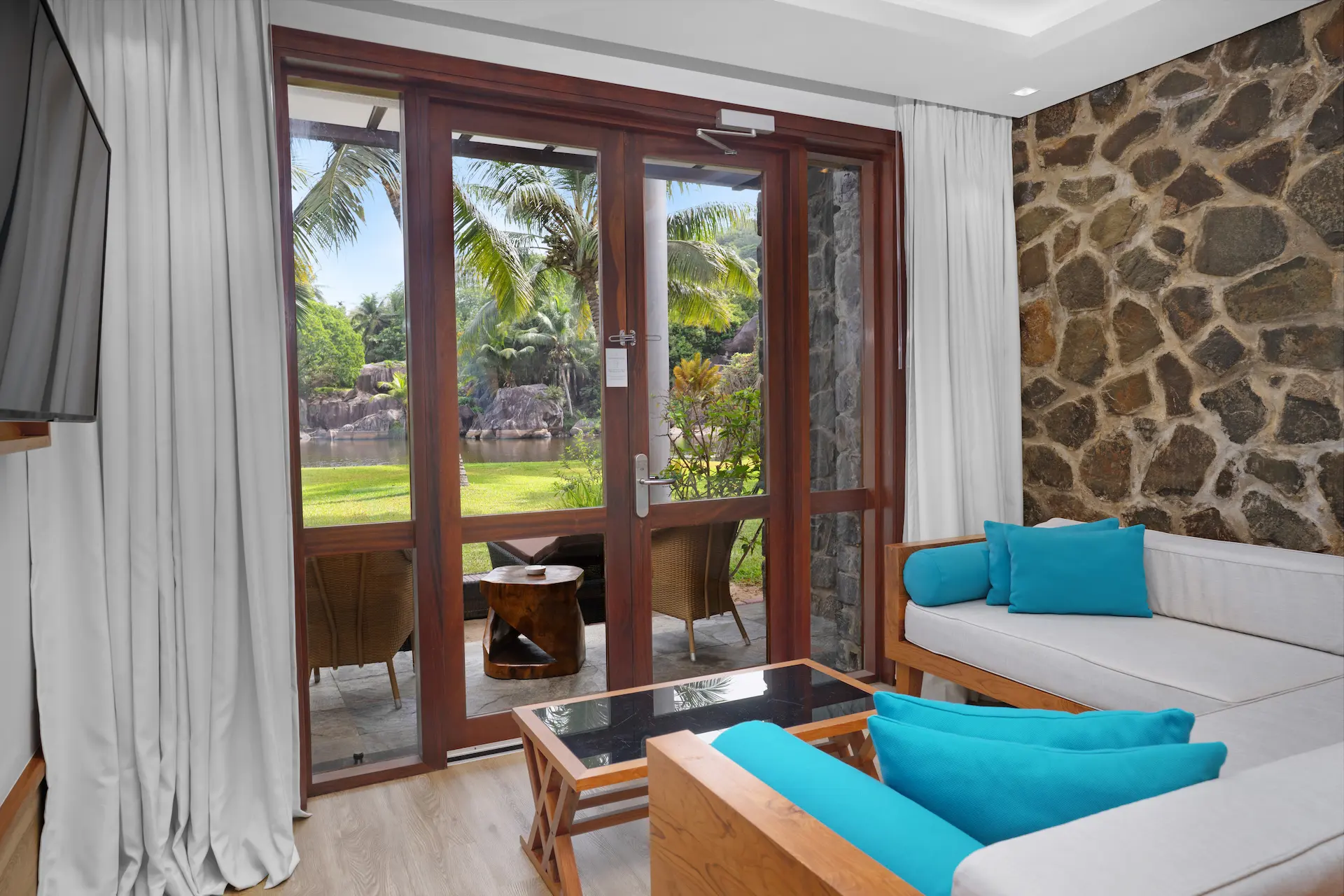kempinski seychelles resort deluxe lagoon view room ground floor with terrace and lagoon view