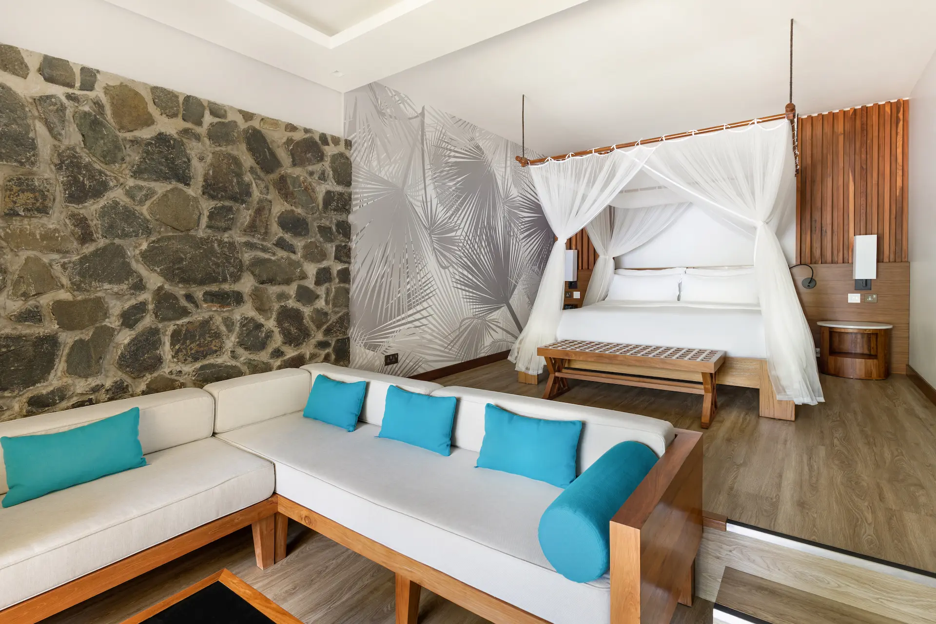 kempinski seychelles resort deluxe lagoon view room lounge area with seating