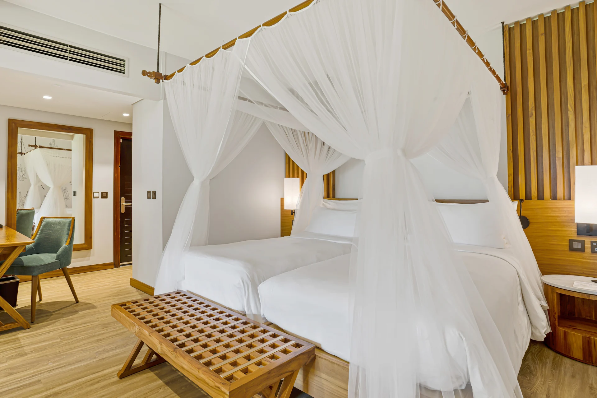 kempinski seychelles resort family room with bed and ocean view