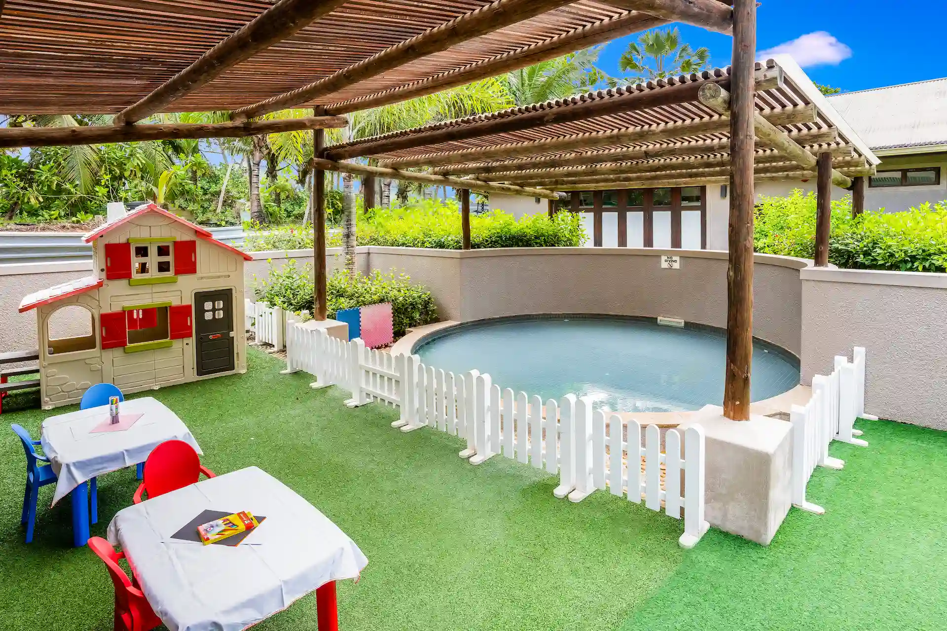 kempinski seychelles resort kids club with play area and pool