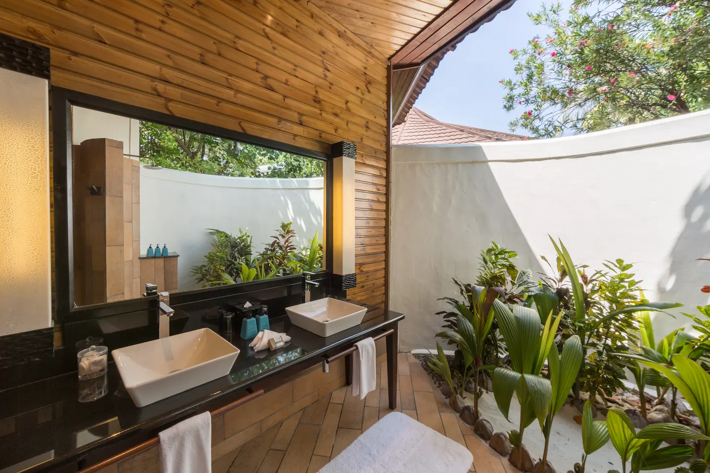 komandoo maldives beach villa bathroom featuring serene luxury island detailing