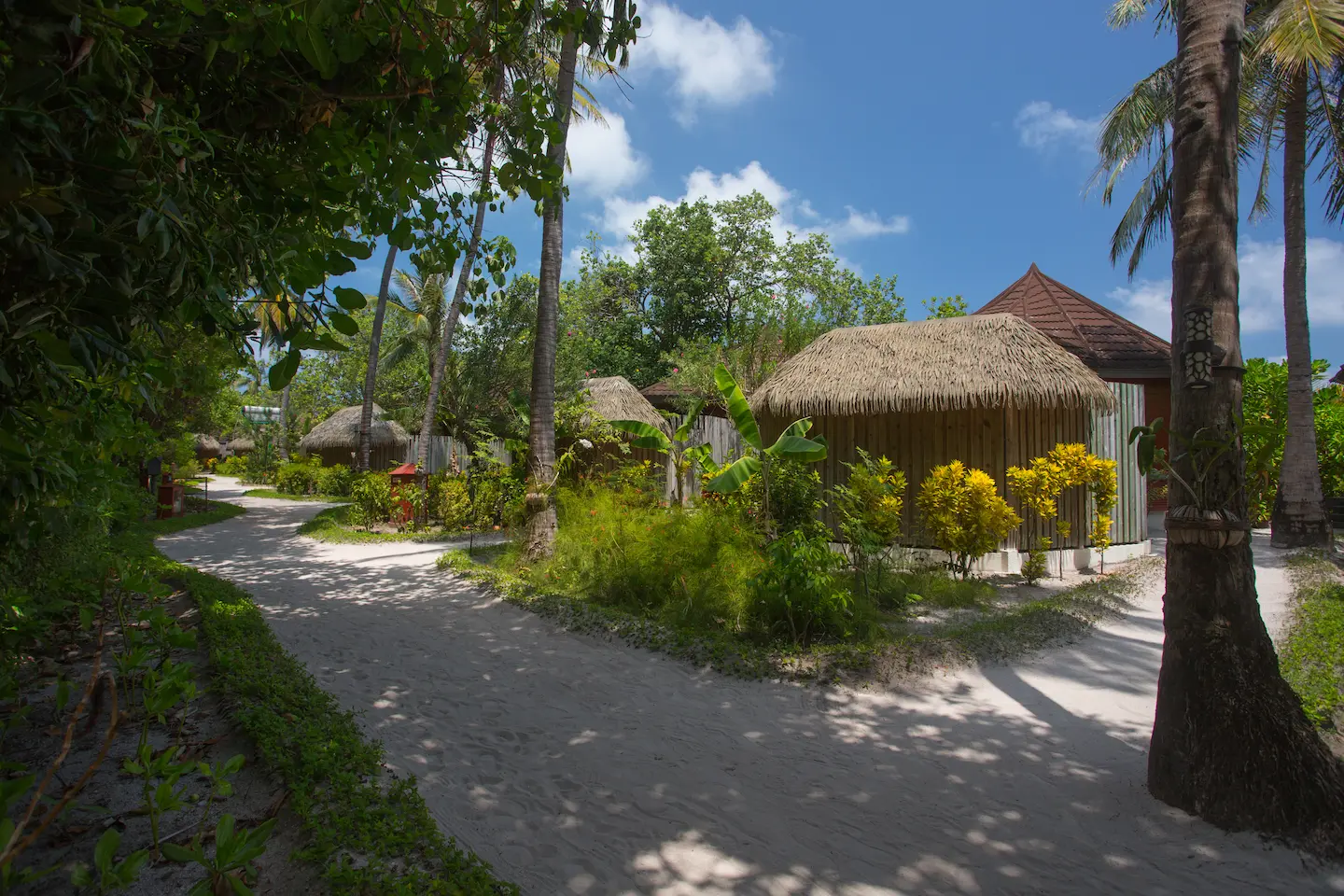 komandoo maldives beach villa exterior showcasing tranquil island luxury by the shoreline