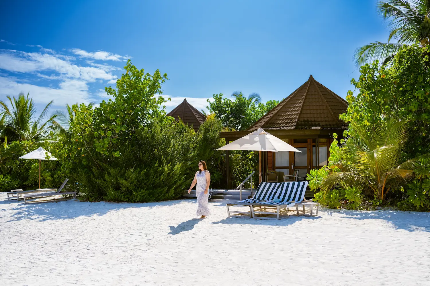 komandoo maldives exterior lifestyle scene showcasing serene island luxury and relaxed coastal ambiance