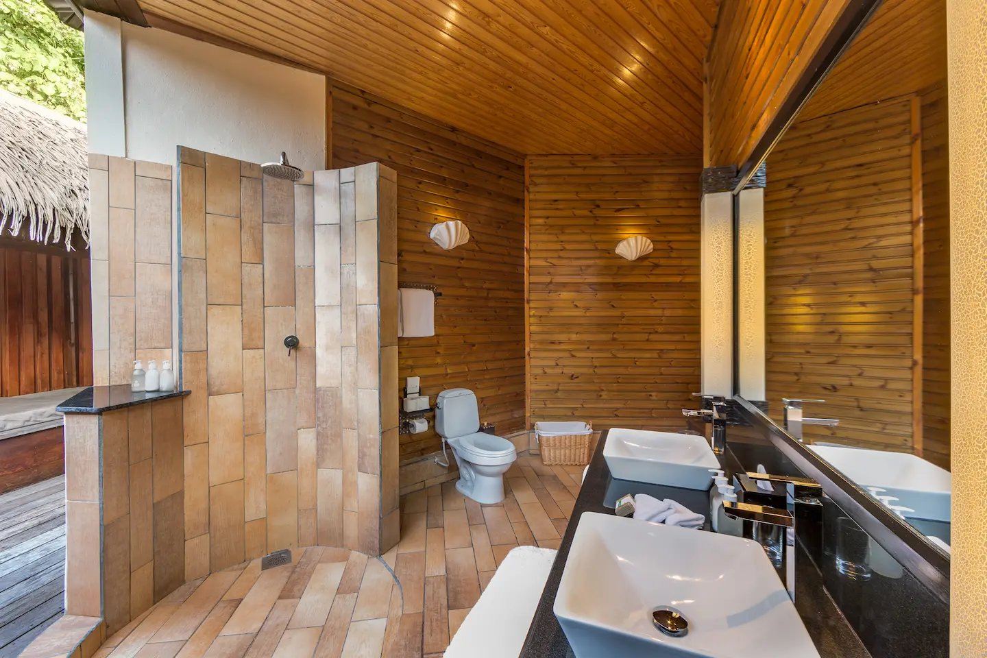 komandoo maldives jacuzzi beach villa bathroom featuring tranquil island luxury and soothing spa ambience