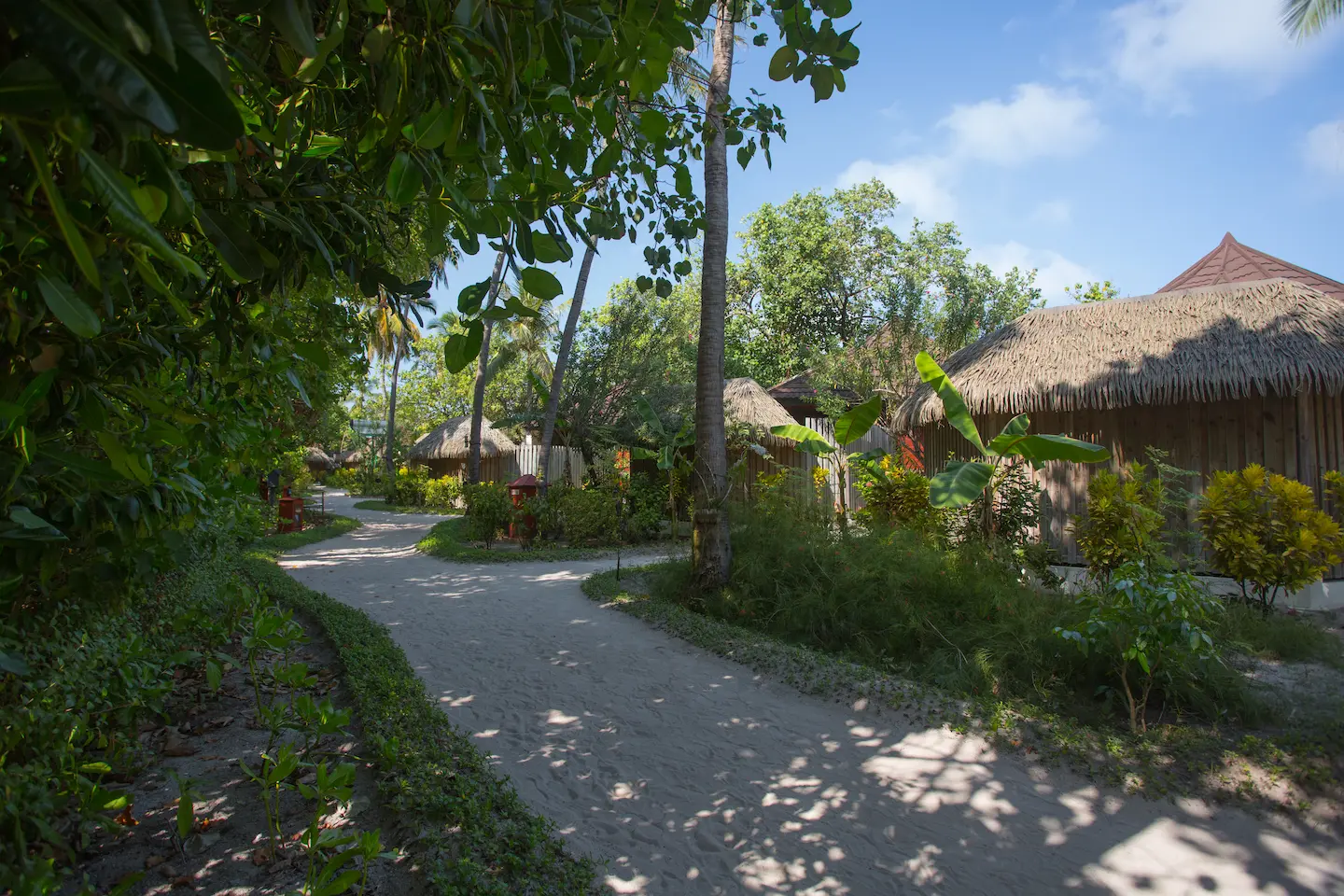 komandoo maldives jacuzzi beach villa exterior showcasing tranquil island luxury by the shoreline